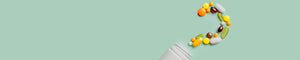 banner of pills in a question mark